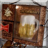 C58. Light-up Budweiser sign. 